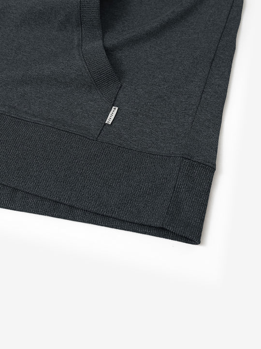 Hem detail of the Brick Heather Athletic Golf Hoodie, highlighting clean stitching and neat design.