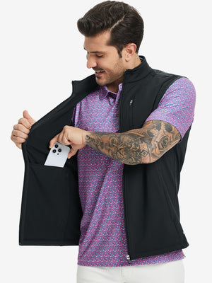Close-up of water-resistant fleece golf vests pocket holding a phone, practical detail in black