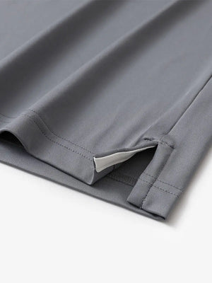 Close-up of side slit detail on LIGHT GREY Chest Print Polo Shirts