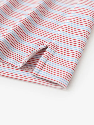 Close-up of side hem slit on Red Blue Stripe Performance Stripe Golf Shirt