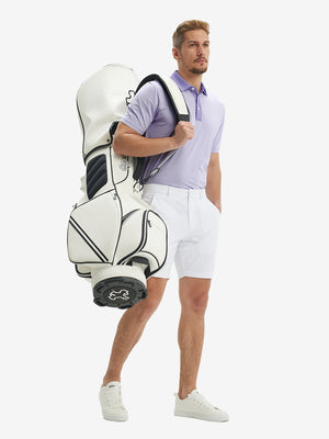 Full front: model in lavenderwhite stripe upgraded two-tone striped quick dry polo shirt carrying golf bag.