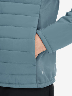 Detail view of outer pocket on slate blue warm puffer winter golf jacket