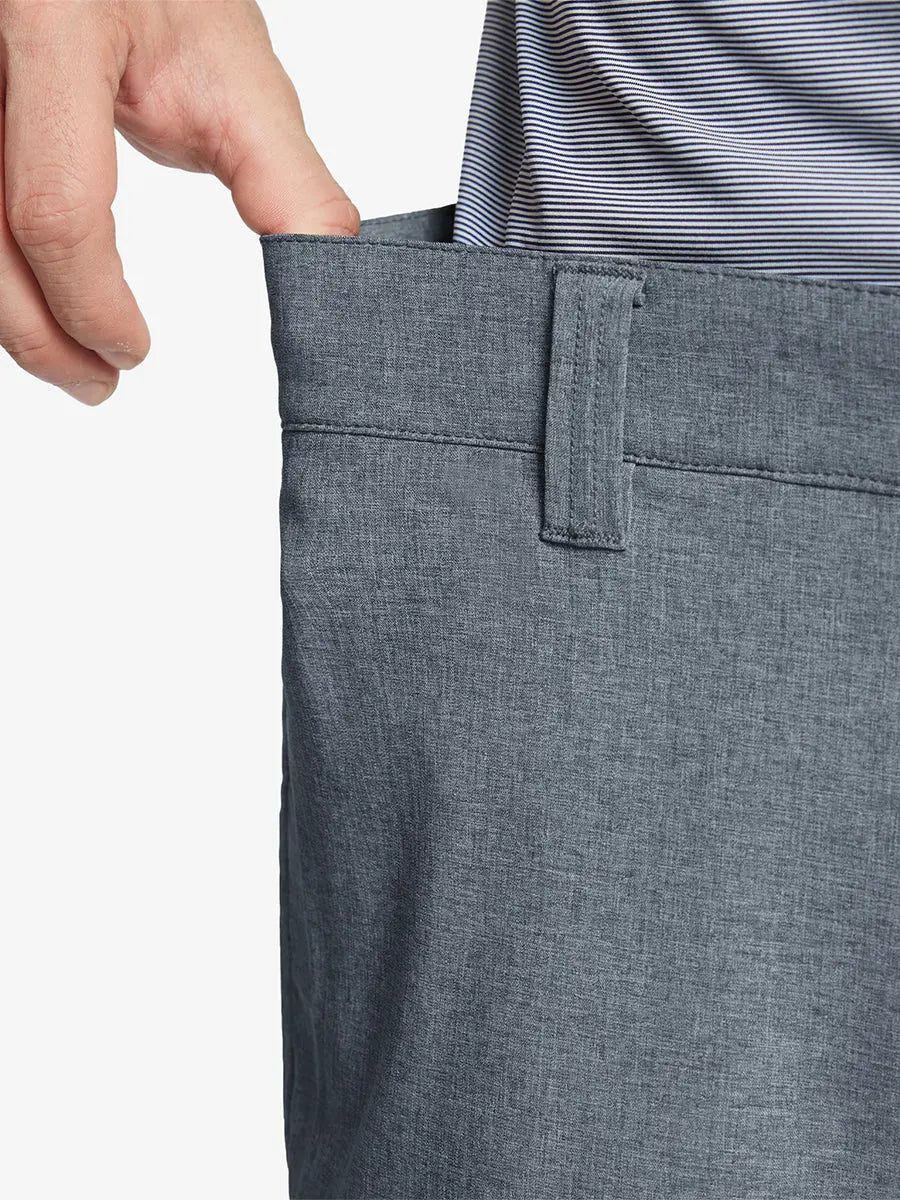 NAVY 7 Inch Heather Performance Golf Shorts close-up of waistband being stretched to show elasticity
