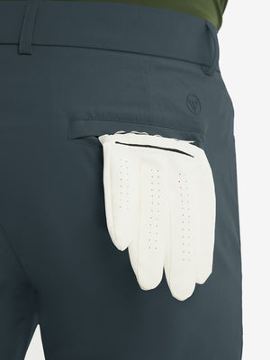 Close-up of the back pocket detail on the grey blue stretch soft flat front dress golf shorts, emphasizing storage
