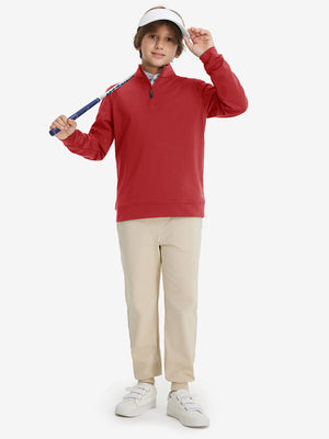 Full body model holding a golf club, styled in youth winter micro-fleece quarter zip pullover with red