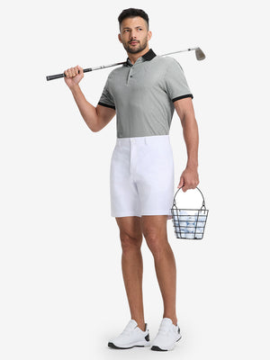 Full-body front view of model with a golf club wearing the black quick dry jacquard ribbed collar golf shirt