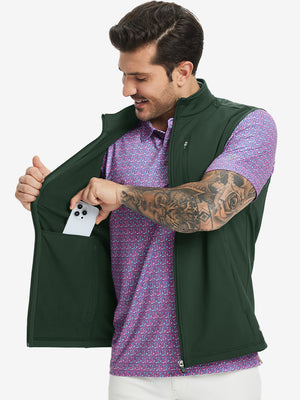 Close-up of water-resistant fleece golf vests pocket holding a phone, practical detail in forest green