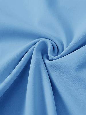 Close-up of ultra-stretch quick dry fabric used in misty blue women's golf sweatpants