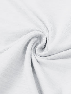 Close-up fabric detail of skin-friendly long sleeve melange polo, soft blend texture with white tone