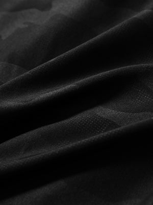 Close-up fabric texture detail of black water-resistant short sleeve q-zip hoodie for boys