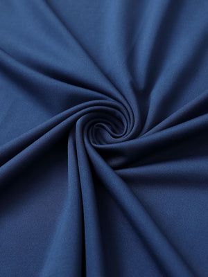 Close-up of blue chest print polo shirt fabric showing smooth texture and crisp graphic application area.