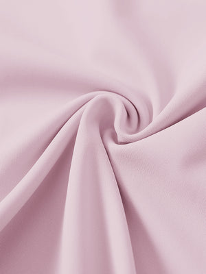 Close-up of ultra-stretch quick dry fabric used in pale pink women's golf sweatpants