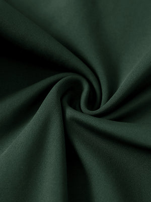 Close-up of ultra-stretch quick dry fabric used in forest green women's golf sweatpants
