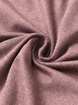 Fabric close-up of quarter zip hoodie with kangaroo pocket, soft texture and cozy feel in pink heather
