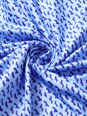 Close-up of bluejay navy dogs golf performance print boys golf polo fabric showing moisture-wicking texture 