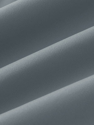 Fabric close-up of Women's 7/8 ankle golf track pants with soft texture in light grey