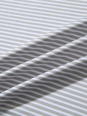 Texture close-up of Kids stripe golf polos with soft fabric and bright grey white stripe stripes