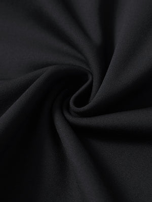 Fabric detail of Fleece lined golf quarter zip showing warm texture in black