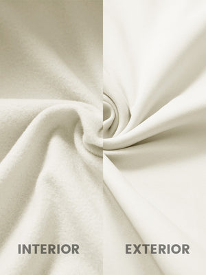 Inside and outer fabric close-up of beige youth winter micro-fleece quarter zip pullover, soft fleece.