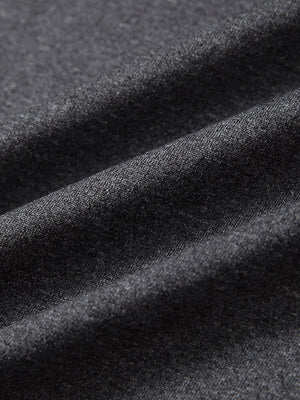 Close-up fabric detail of moisture wicking quarter zip pullover, smooth knit and quick-dry feel in black melange