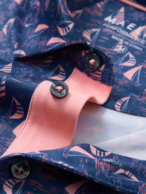 Detail shot of the collar on the navy sailboat 4 way stretch print collared polo shirt, emphasizing the classic neckline design