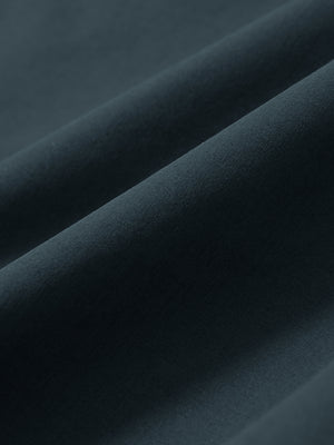 Macro view of the grey blue stretch soft flat front dress golf shorts fabric, showcasing the smooth texture