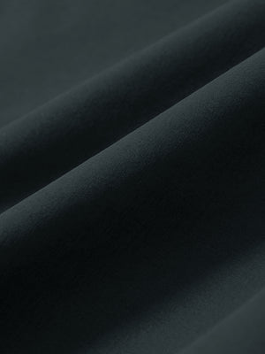 Macro view of the iron grey stretch soft flat front dress golf shorts fabric, showcasing the smooth texture