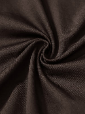 Close-up texture of  coffee brown warm puffer winter golf jacket fabric showing detailed premium material and weave