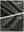 Close-up texture of army green women's moisture-wicking athletic tennis skirts fabric showing detailed outer and inner lining material.