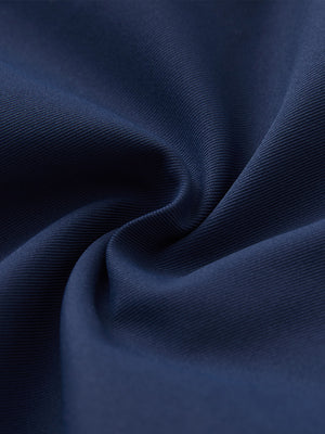 Close-up of fabric on water resistant versatile 8 pockets shorts, showing texture and finish in blue indigo.