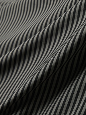 Close-up of black stripe golf polo upgraded two-tone striped quick dry polo shirt, showcasing texture and print details.