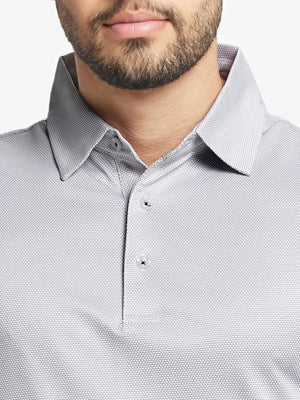 Close-up front view from nose to chest wearing GREY WHITE Performance Ananas Jacquard Polo