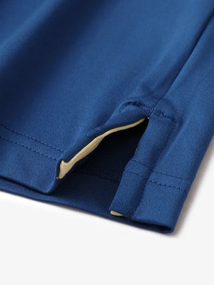 Close-up of side slit detail on Blue Chest Print Polo Shirts