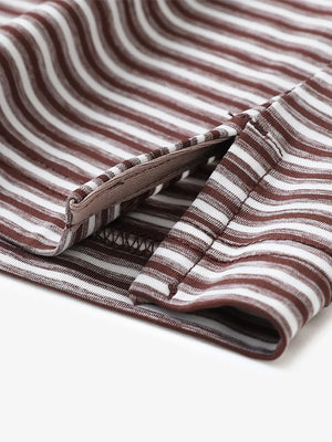 Close-up detail of hem opening on Sport Fit Stripe Polo in Brown Stripe