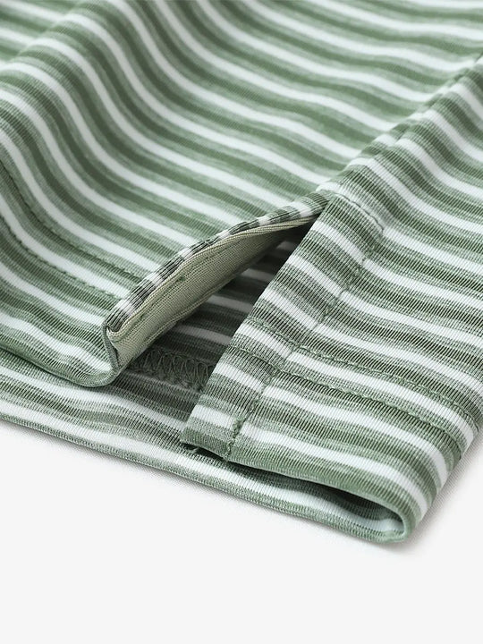 Close-up detail of hem opening on Sport Fit Stripe Polo in Dark Green Stripe