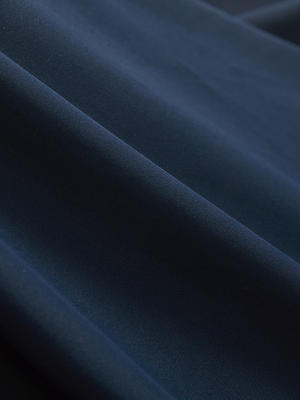 Close-up of navy Moisture-Wicking Short Sleeve Henley Shirt fabric texture.