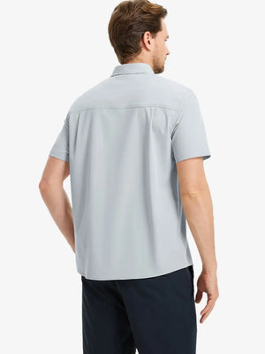 Half-body back view displaying the clean lines of the GLACIER GREY polo.