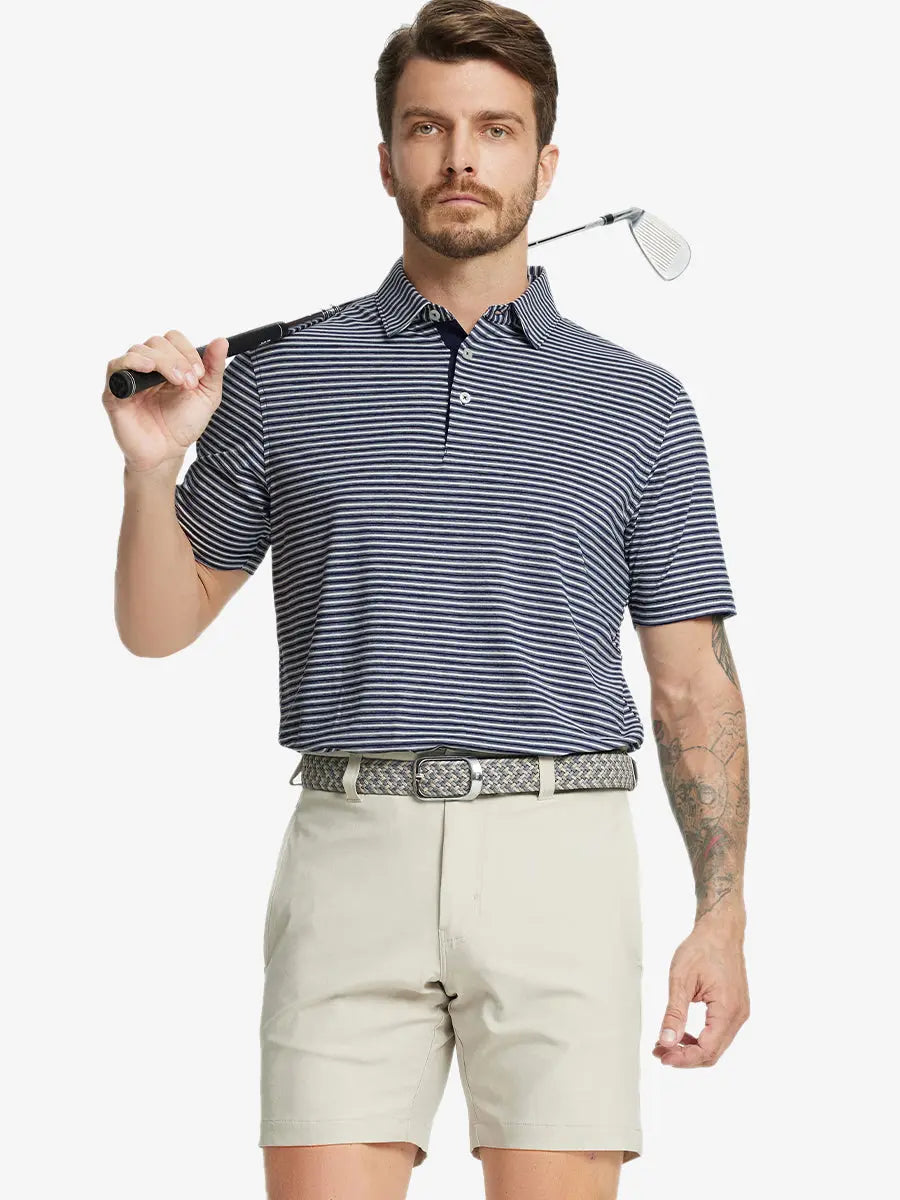 Front half-body shot of model holding golf club, wearing Sport Fit Stripe Polo in Navy Stripe