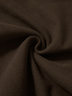 Fabric close-up of coffee brown water resistant comfy fleece golf joggers, soft fleece texture with water-resistant finish.